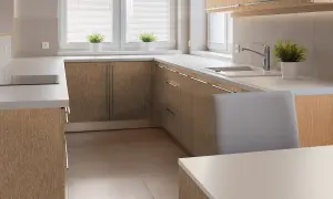 Nowoczesna kuchnia z frontami szafek w naturalnej okleinie dębowej. Jasne blaty i minimalistyczne uchwyty.
