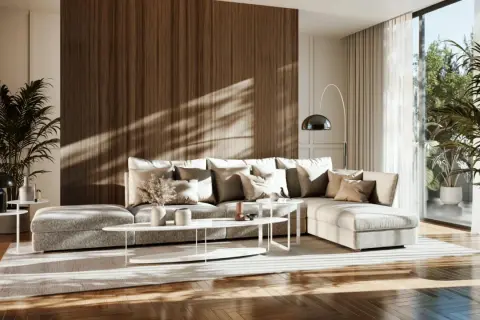 Przytulny salon w stylu japandi z dużą, wygodną sofą, drewnianą ścianą i roślinami.