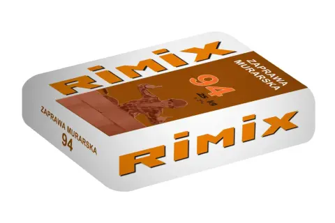 Zaprawa murarska Rimix 94, 25 kg. Budowlaniec z uśmiechem pokazuje, jak łatwo można murować z tą zaprawą.